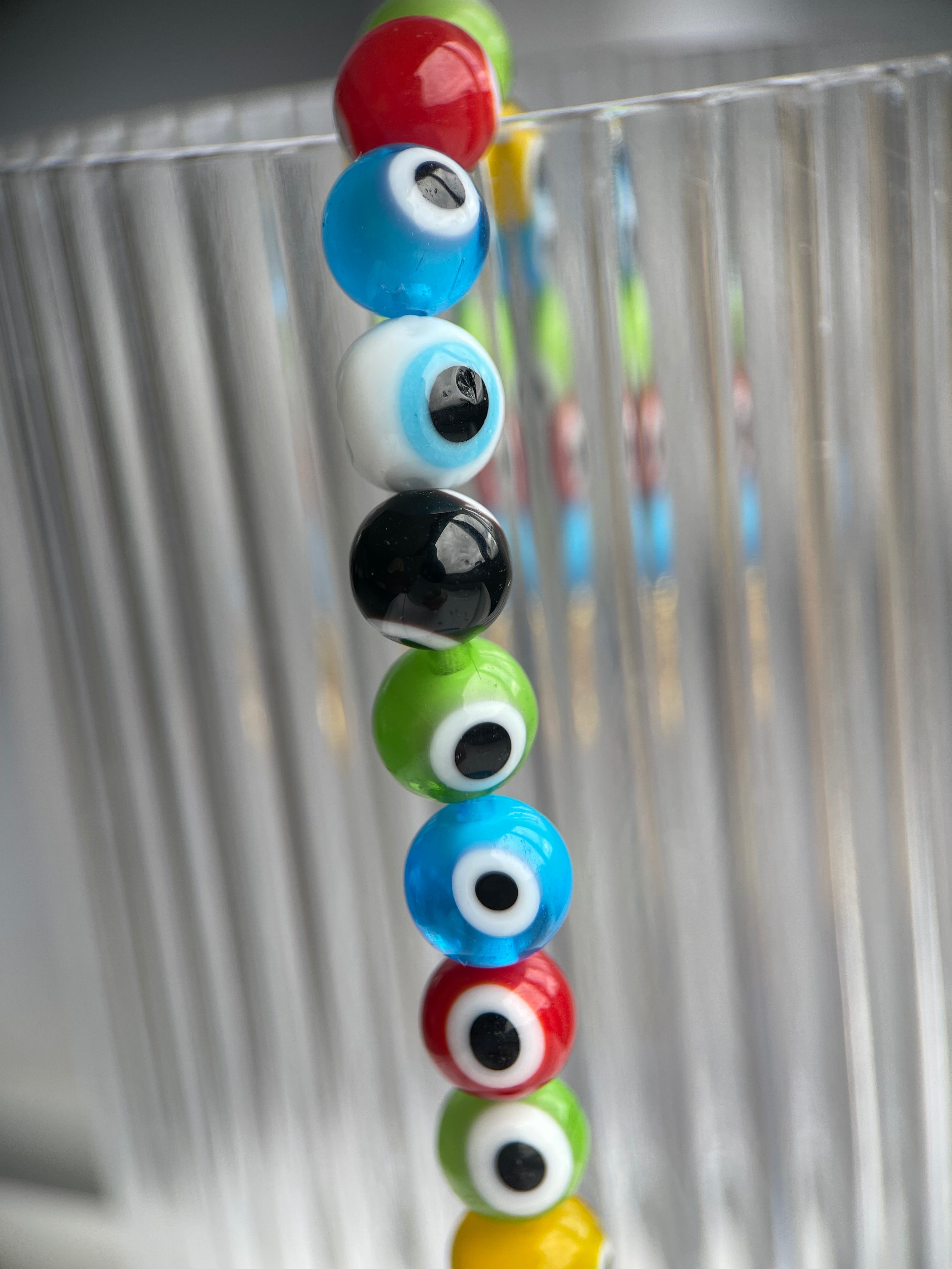 Pulseira olho color vidro