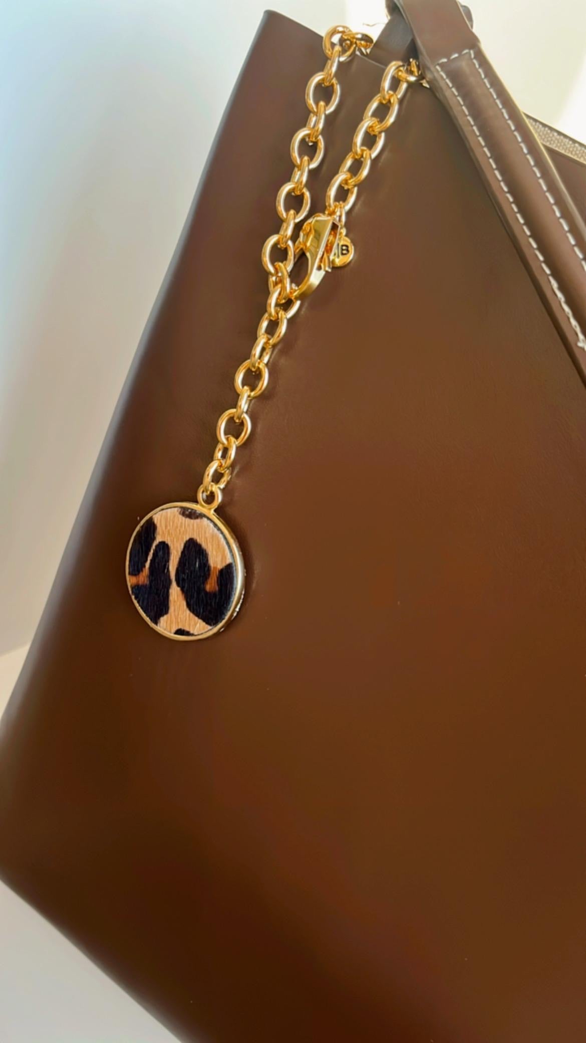 Charm bolsa animal print