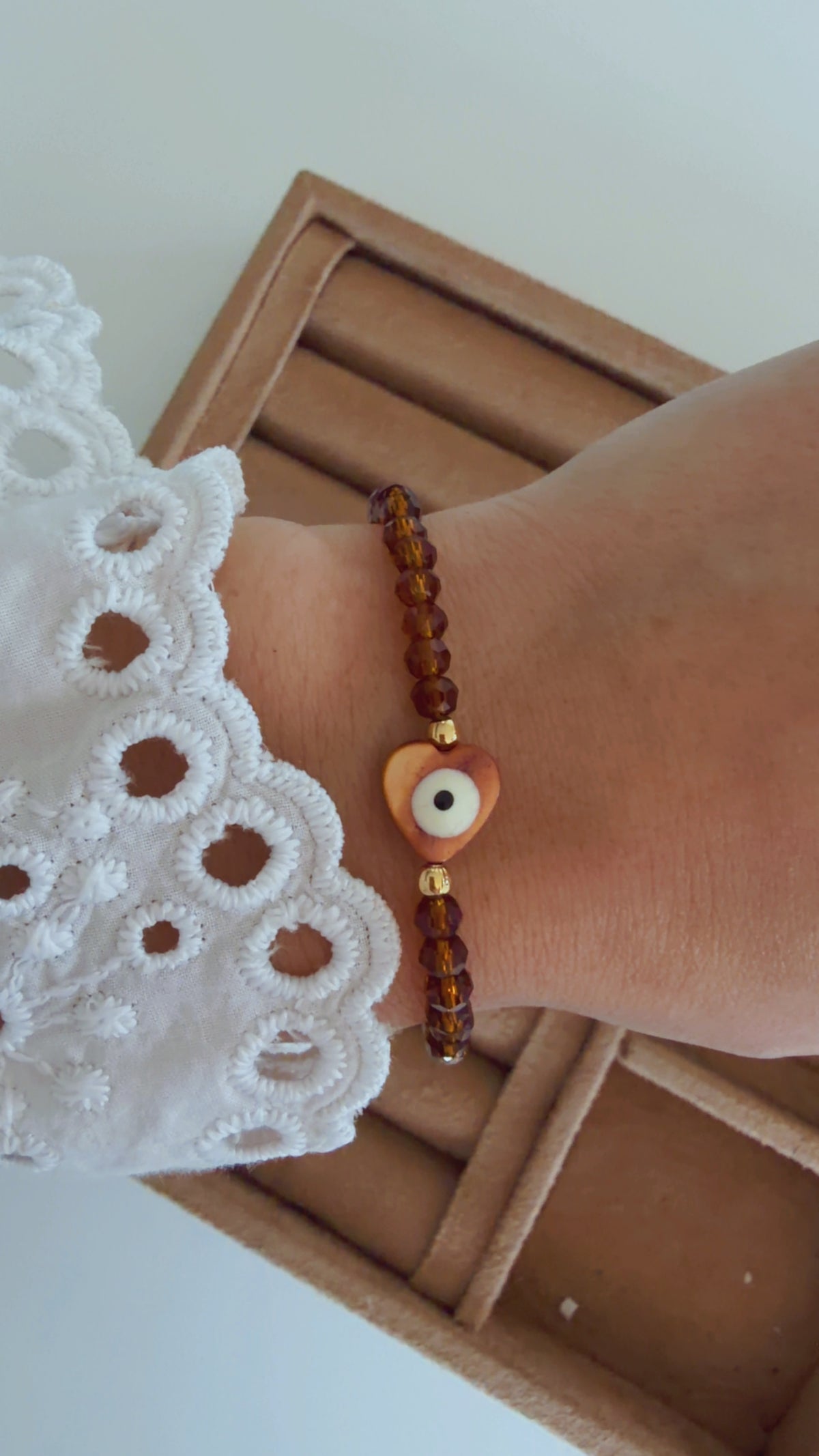 Pulseira cristal olho coração âmbar