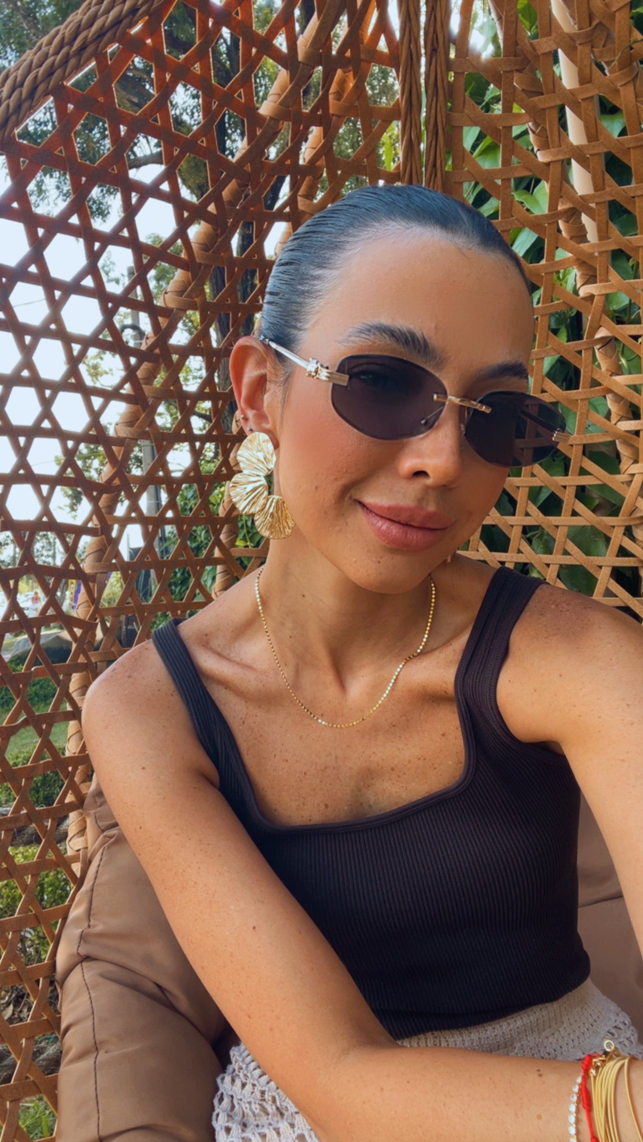 Brinco leque de conchas