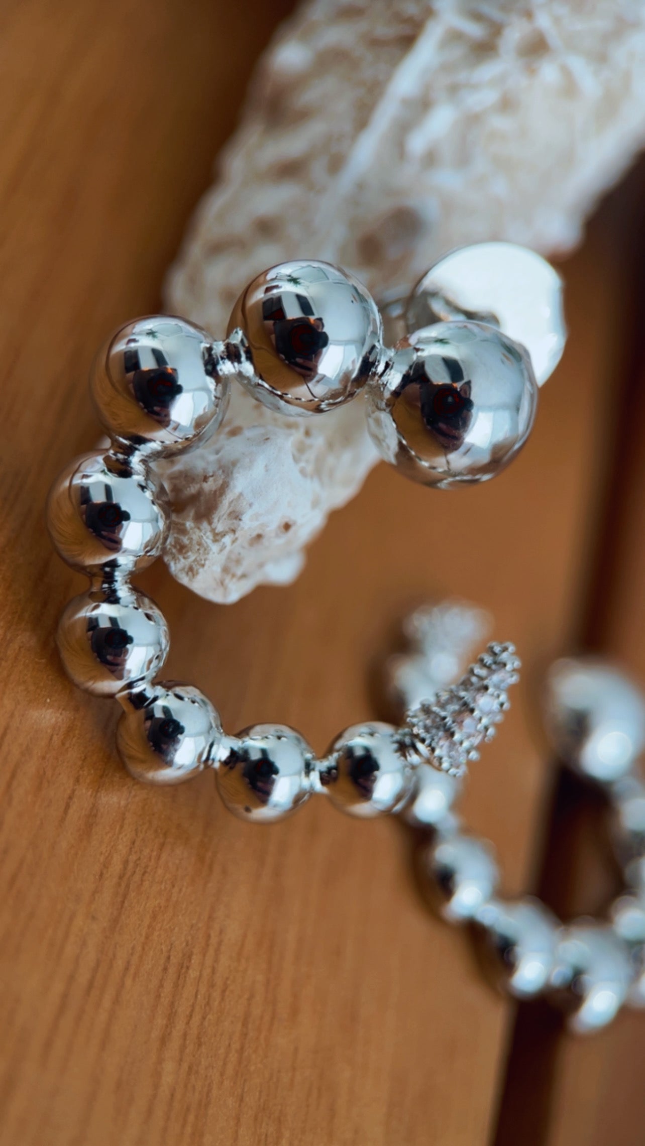 Brinco círcula cravejado níquel