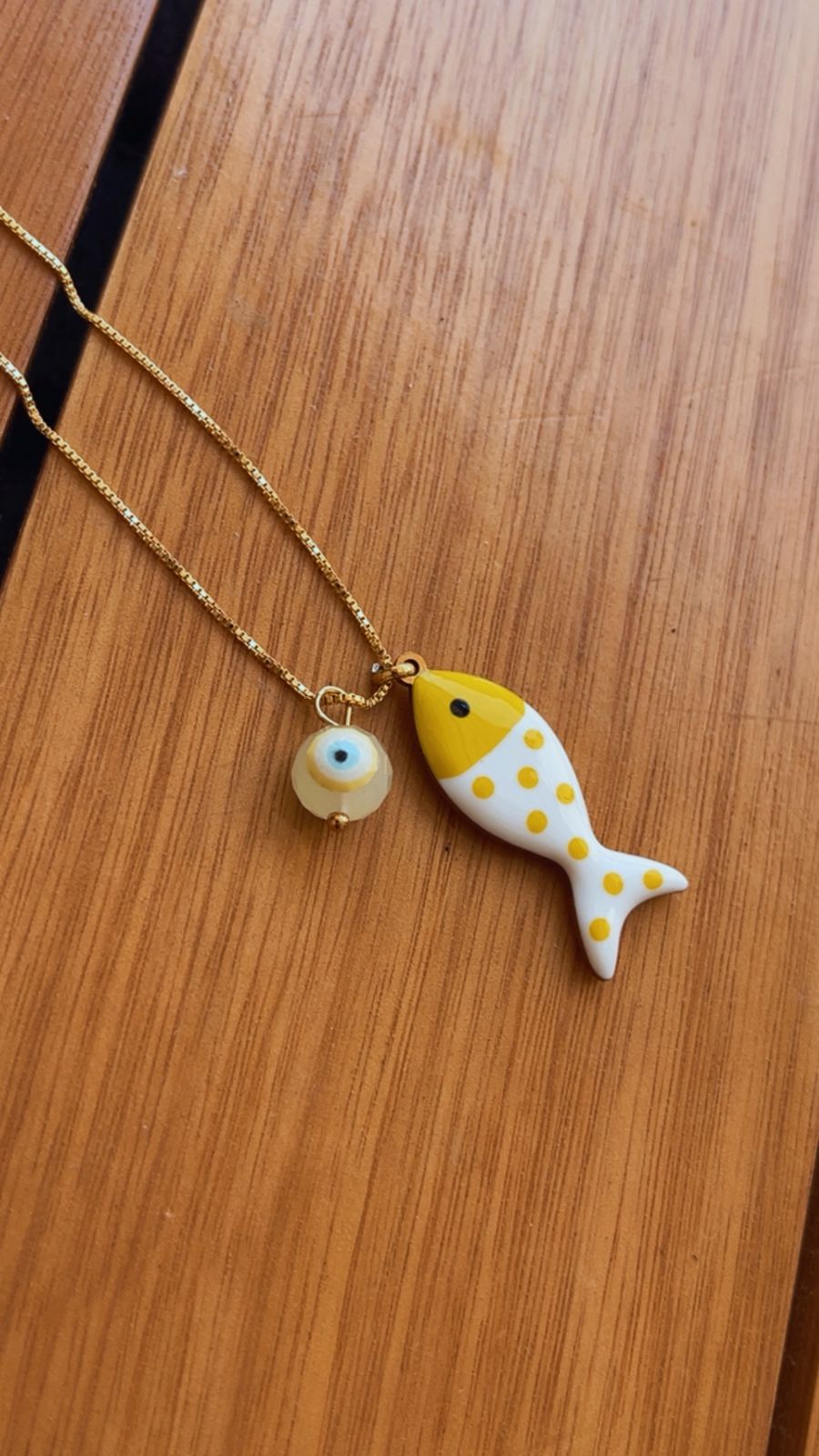 Colar patuá do mar amarelo