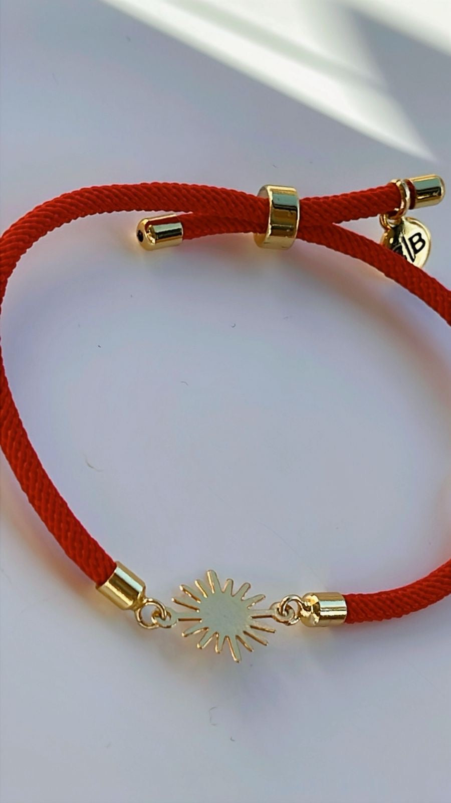 Pulseira por do sol vermelho