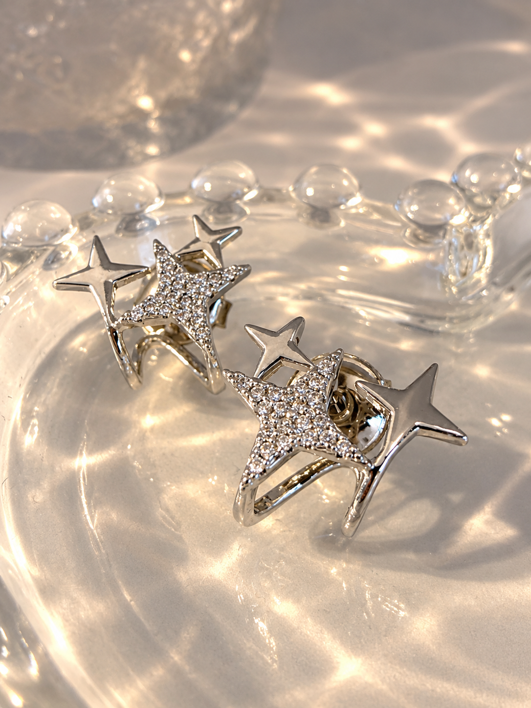 Brinco Trio Estrelas Ródio