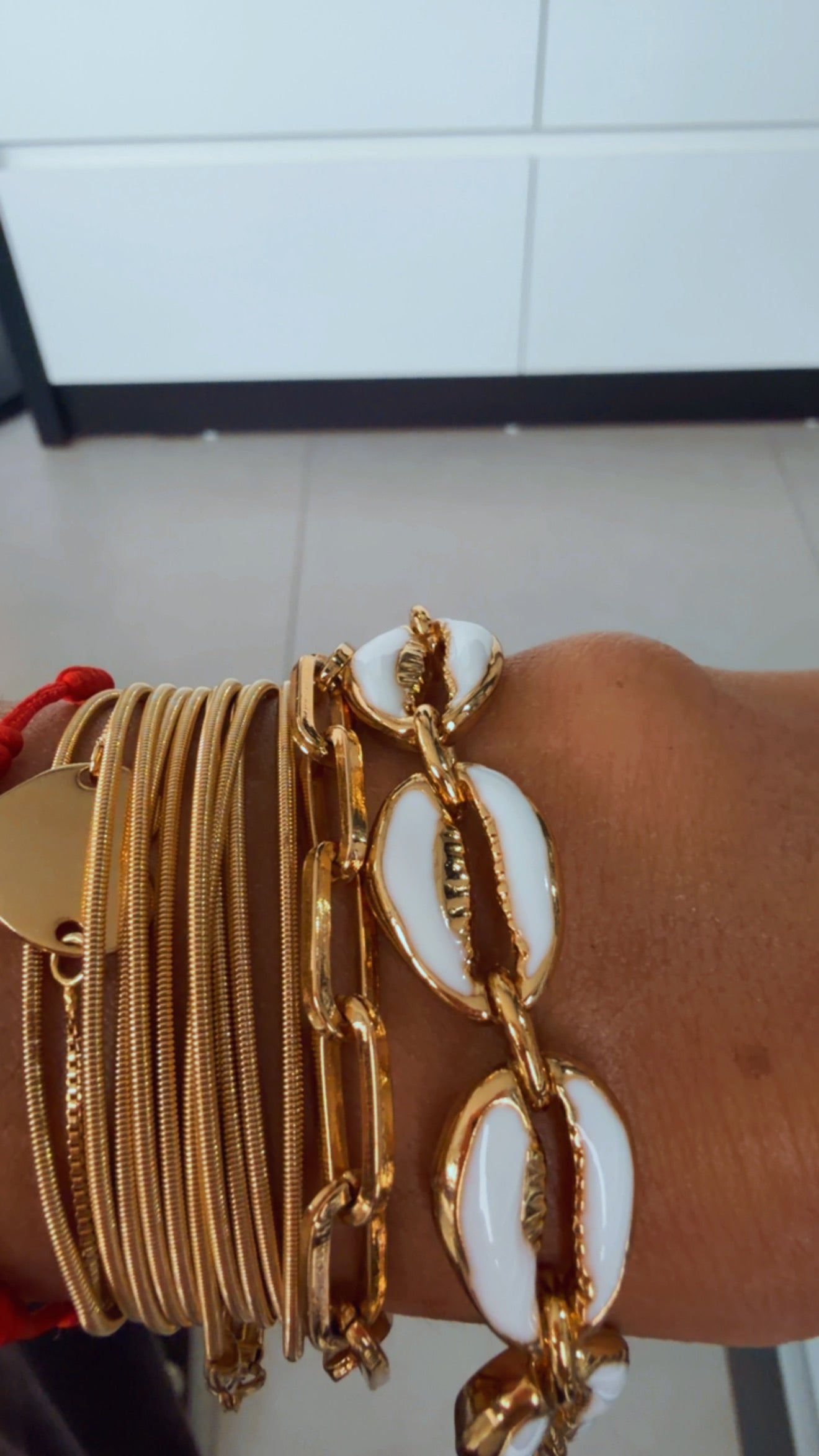 Pulseira búzios metal