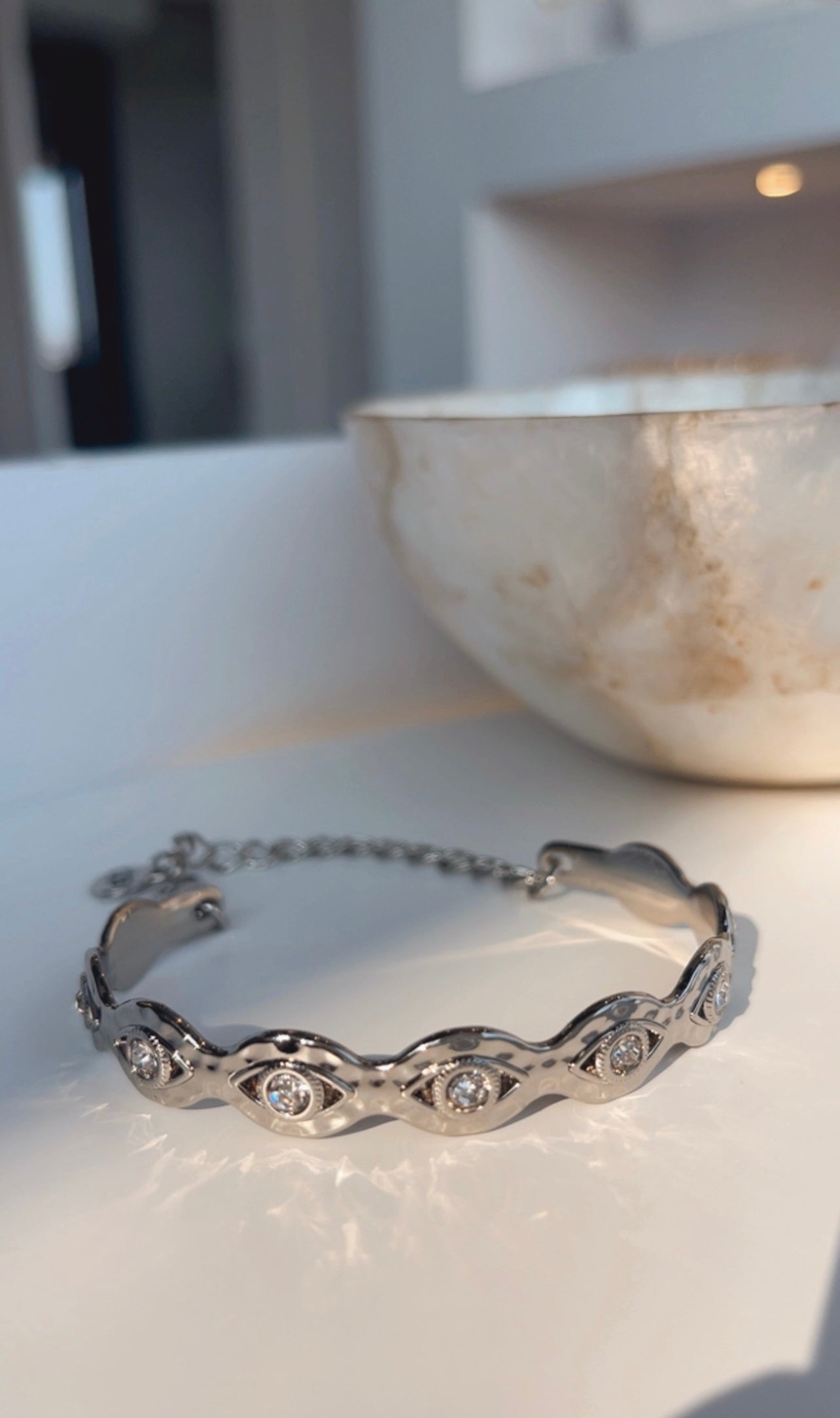 Pulseira bracelete olho strass níquel