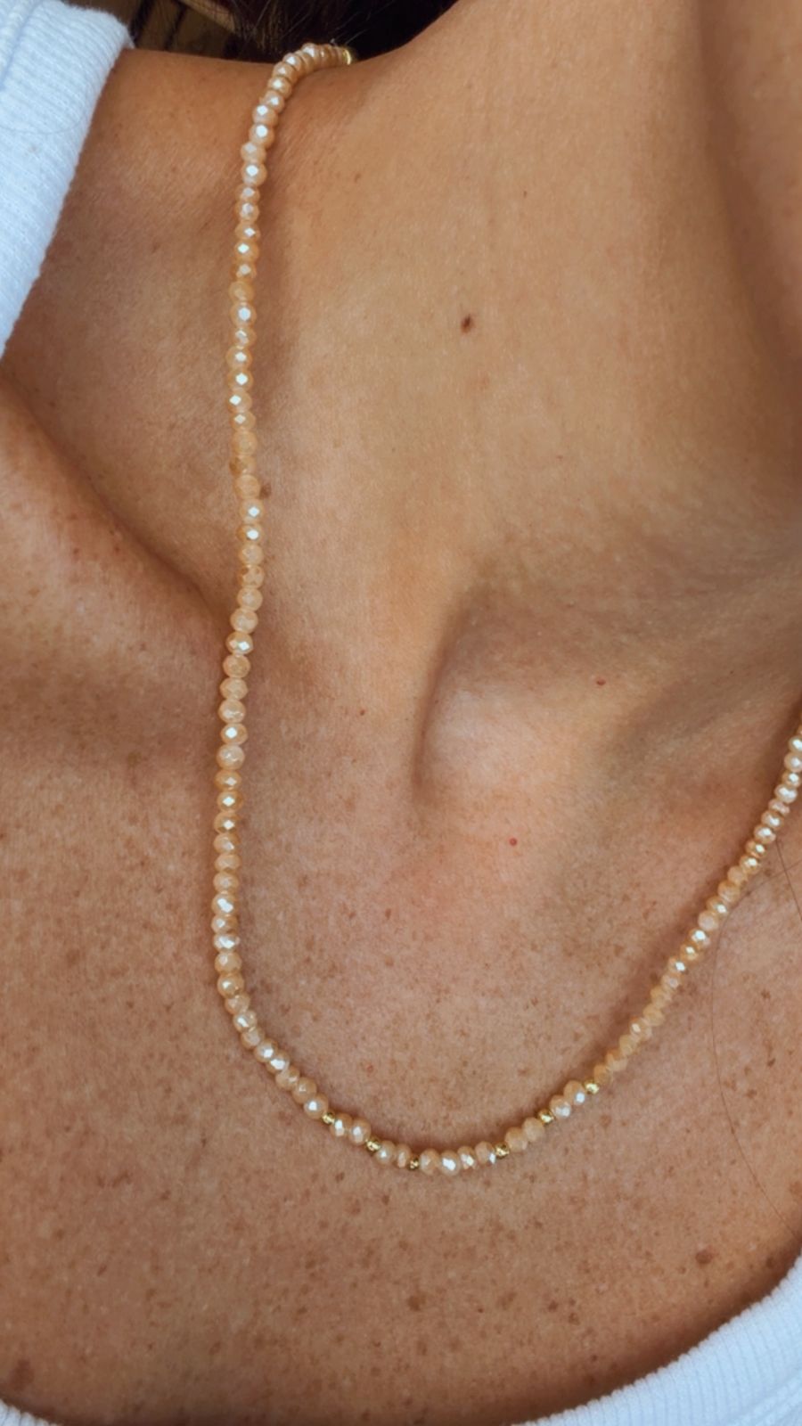 colar amuleto nude